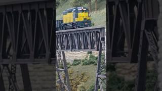 CNW GP30 local crosses the iron bridge #modelrailroad #gp30 #scaletrains #iron #bridge #cnw #camera