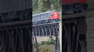 The SP lease power pulls the UP coaches over the iron bridge #sanantonio #up #sp #iron #bridge #gray