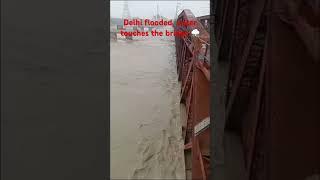 Delhi flooded, Yamuna water touches iron bridge. Near Geeta Colony Pusta road, Gandhi Nagar, redfort