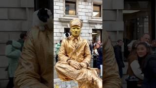 How London Levitating Goldman Statue and his friends are starting the day. #livingstatue #floating