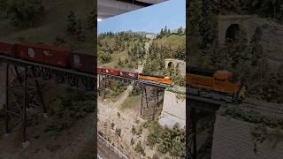 The Heritage BNSF engine crosses the iron bridge #diesel #railway #fun #bnsf #freight #dcc #mountain