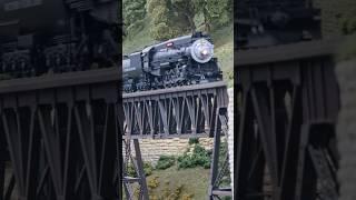 SP steam engine pulls the mix freight over the iron bridge #model #railway #southern #pacific #fun