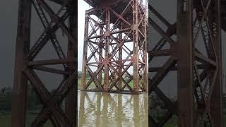 Jump from iron Bridge into the river surma, Sylhet, Bangladesh.