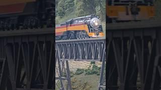 The GS4 Daylight pulls the Amtrak coaches across the iron bridge #model #train #fun #daylight #steam