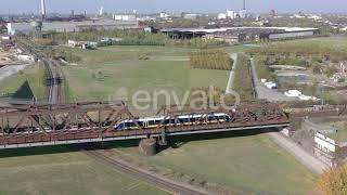 Commuter Train Passing Over an Old Iron Bridge | Stock Footage - Envato elements