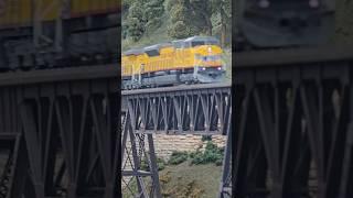 The Union Pacific mixed freight manifest crosses the iron bridge #model #fun #railway #train #up #tx